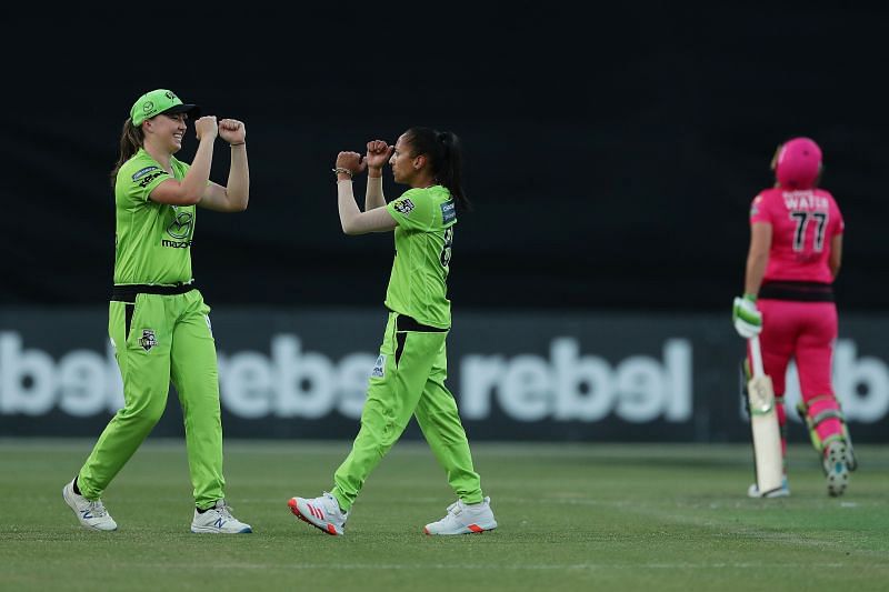 Shabnim Ismail (right) celebrates after picking up a wicket in WBBL 2020.