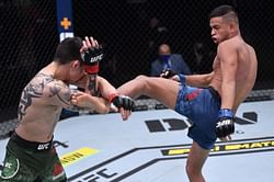 WATCH: Brandon Royval's coach snaps his dislocated shoulder back into place at UFC 255