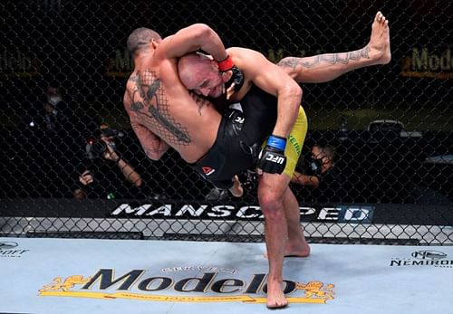 Glover Teixeira weathered the storm to submit Thiago Santos in last night's UFC main event.