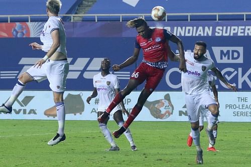 Jamshedpur FC and Chennaiyin FC in action in the seventh edition of ISL held at Goa