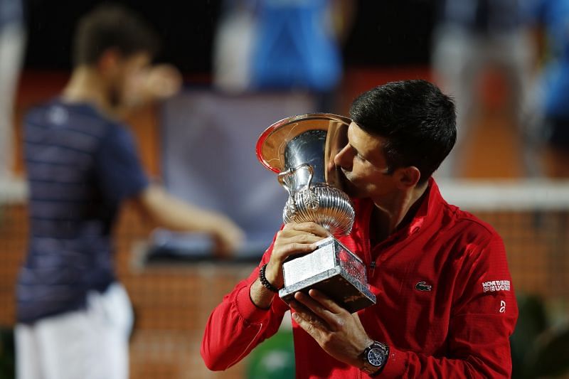 Novak Djokovic celebrates with his trophy at the Internazionali BNL d'Italia