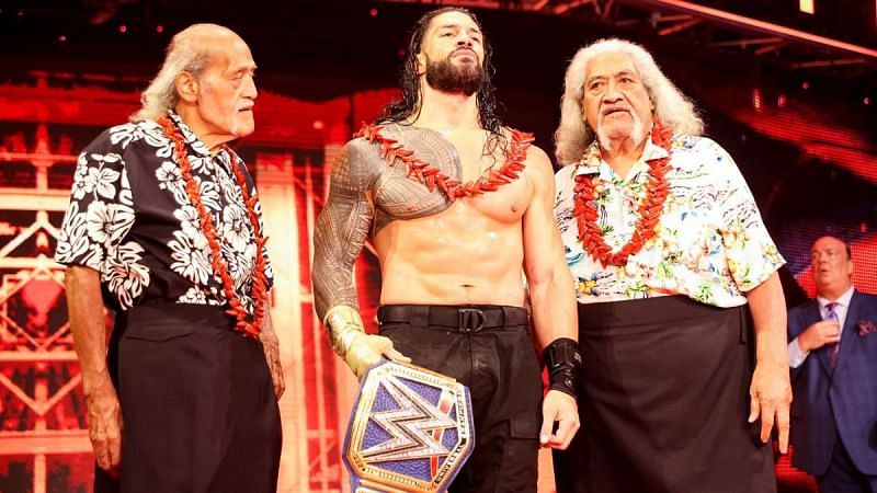 Roman Reigns and The Wild Samoans (Afa and Sika)