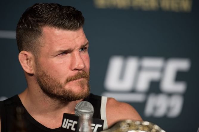 Former UFC Middleweight Champion Michael Bisping slams fan who claims Covid-19 is a 'worldwide scam'
