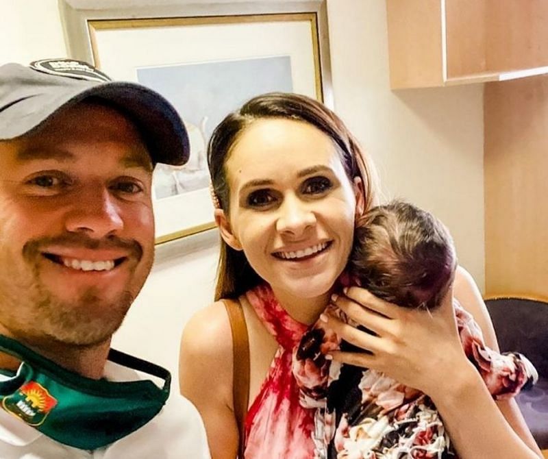 AB de Villiers (L) with his wife Danielle and their new-born baby