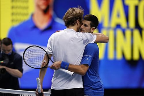 Alexander Zverev (L) and Novak Djokovic