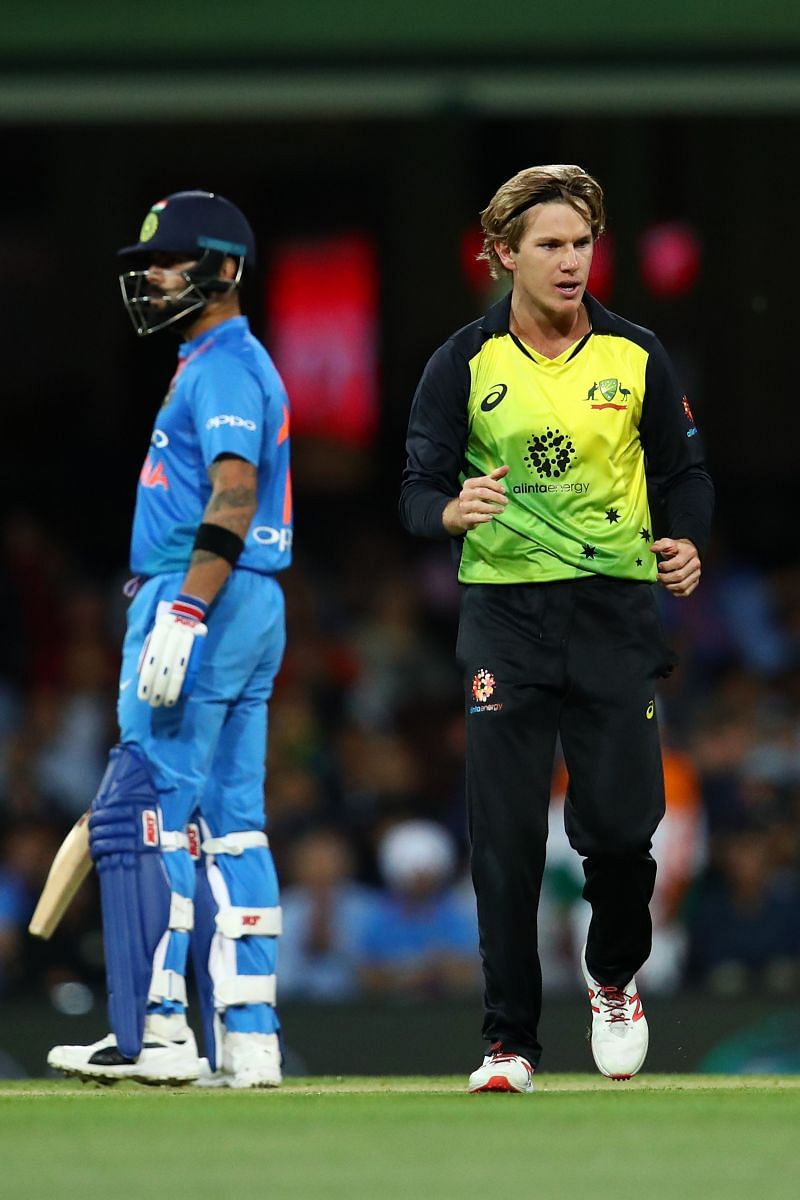 Adam Zampa and Virat Kohli.