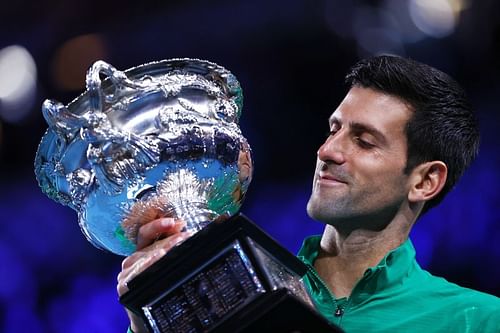 Novak Djokovic with the 2020 Australian Open trophy