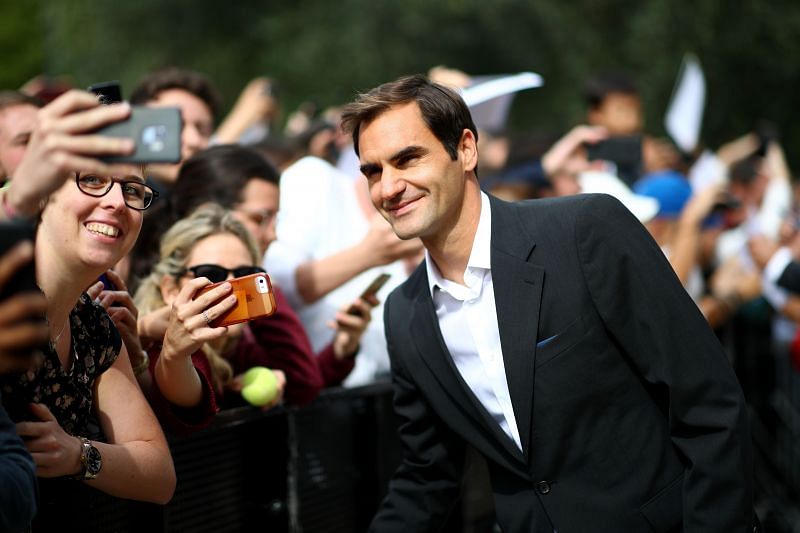 Roger Federer with his fans
