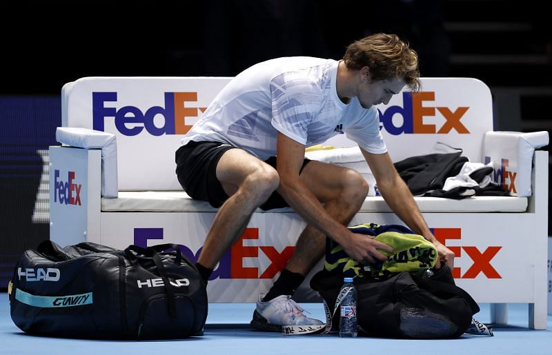 Alexander Zverev packs his bags after losing to Novak Djokovic