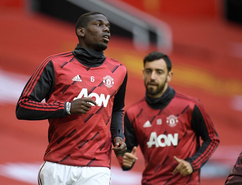 Paul Pogba (left) and Bruno Fernandes (right) of Manchester United