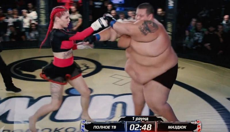Watch: Female fighter Darina Madzyuk destroys man who outweighs her by almost 400 pounds in MMA fight!