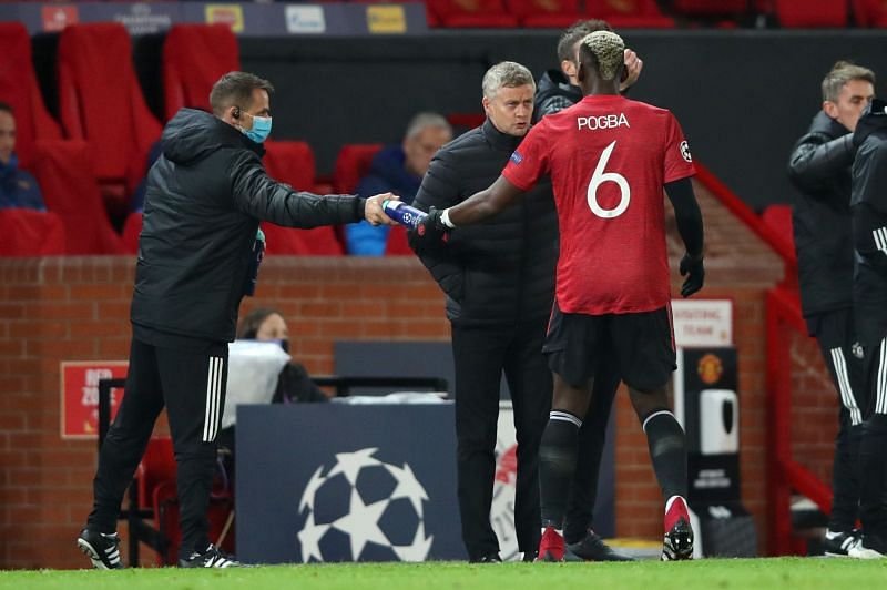 Paul Pogba in discussion with Manchester United manager Ole Gunnar Solskjaer