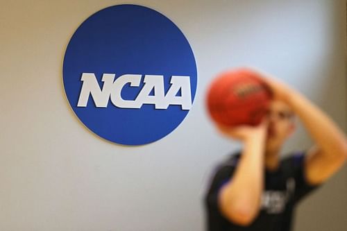 COVID-19 cases cause Johns Hopkins to ban fans at the NCAA Division III basketball tournament.