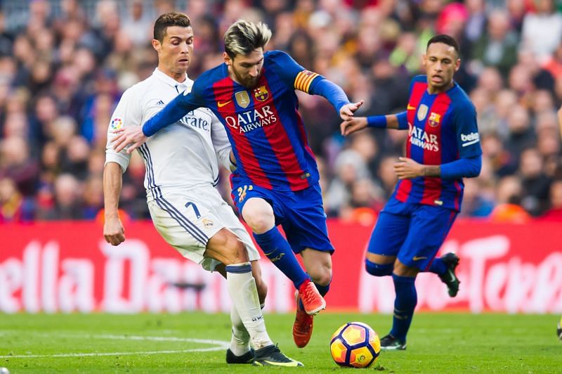 Cristiano Ronaldo and Lionel Messi in action