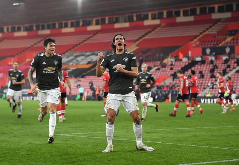 Edinson Cavani (right) of Manchester United celebrates with teammate Victor Lindelof. 