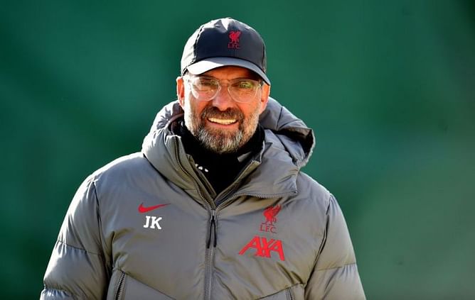 Former Liverpool defender Jamie Carragher believes Manchester City remain Reds' biggest title rivals