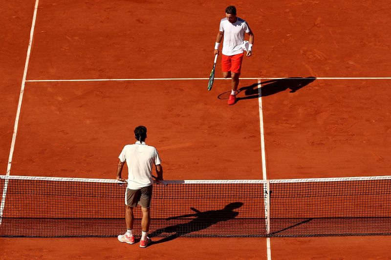 Roger Federer and Casper Ruud at the 2019 French Open