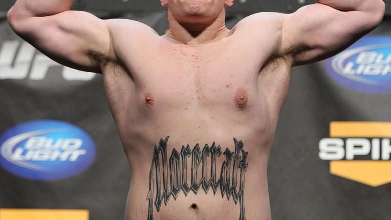 Christian Morecraft tattooed his name onto his stomach in an odd font