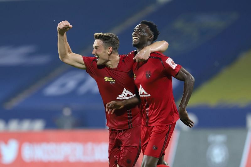 Sylla celebrates with Dylan Fox after scoring the equalizer in the 90th minute.