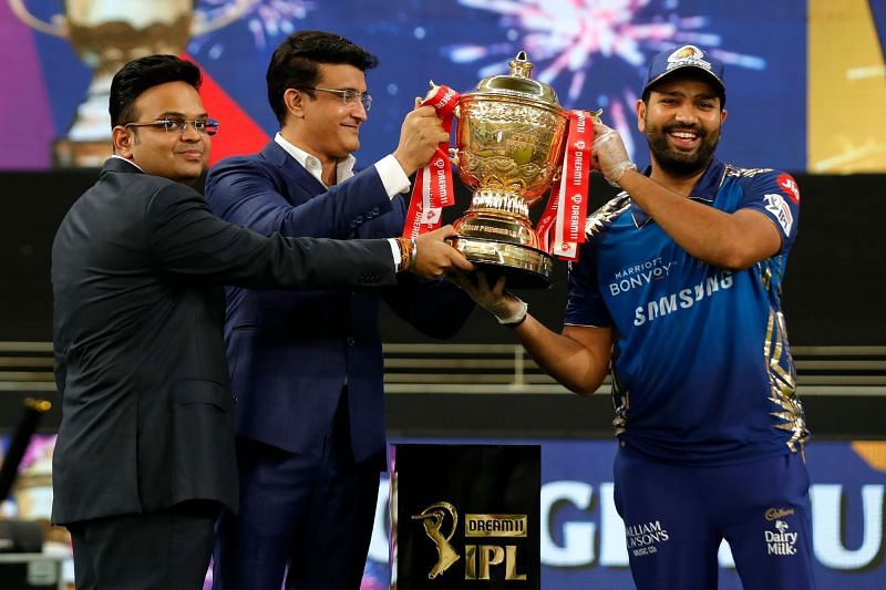 Rohit Sharma (right) receives the IPL 2020 trophy from Sourav Ganguly and Jay Shah (Image credits: timesnownews.com)