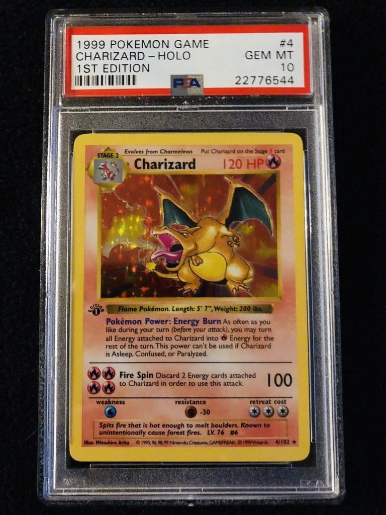 Een zeldzame Charizard Pokemon kaart die is ingedeeld in een bedrijf (Afbeelding via De Pokemon Company)