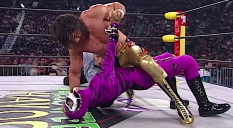 Eddie Guerrero and Rey Mysterio grapple in the ring during their WCW &#039;mask vs title&#039; match