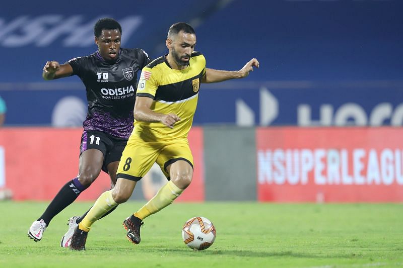 Joao Victor shields the ball against Odisha FC's Diego Mauricio (Image courtesy: ISL Media)