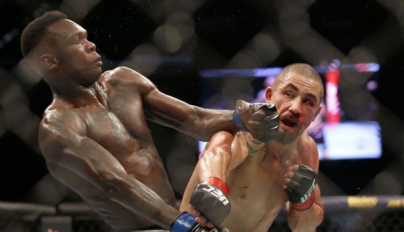 Israel Adesanya beat Robert Whittaker in their first encounter