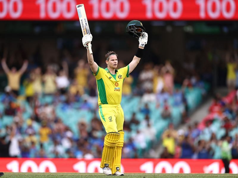 Steve Smith celebrates scoring a century in the second ODI between India and Australia.