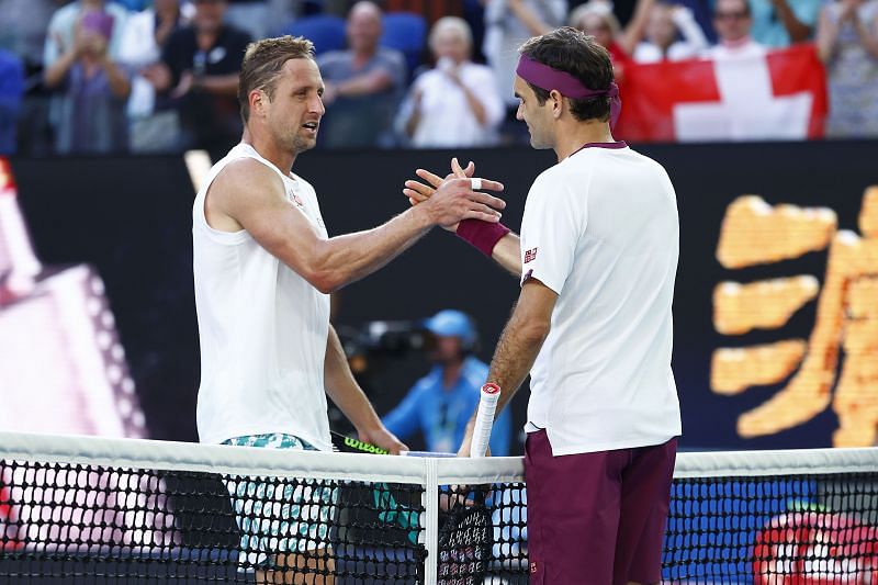 Tennys Sandgren and Roger Federer