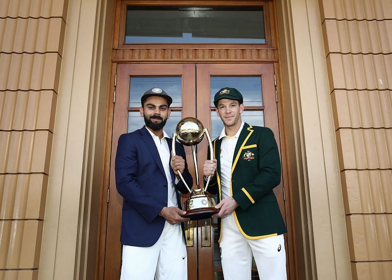 Virat Kohli and Tim Paine pose with the Border-Gavaskar trophy
