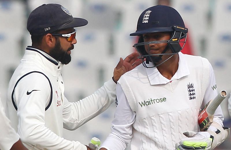 Virat Kohli (L) and Haseeb Hameed (R) during the Rajkot Test in November, 2016