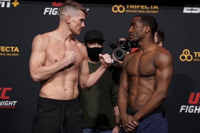 Opponents Stephen Thompson and Geoff Neal face off