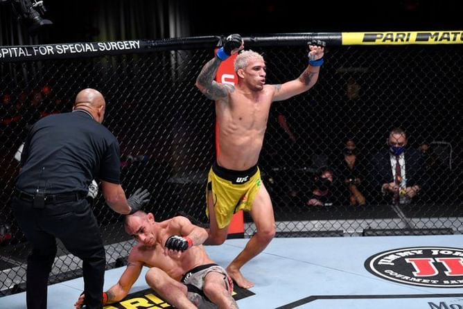Charles Oliveira goes full 'Khabib' on Tony Ferguson to win dominantly at UFC 256