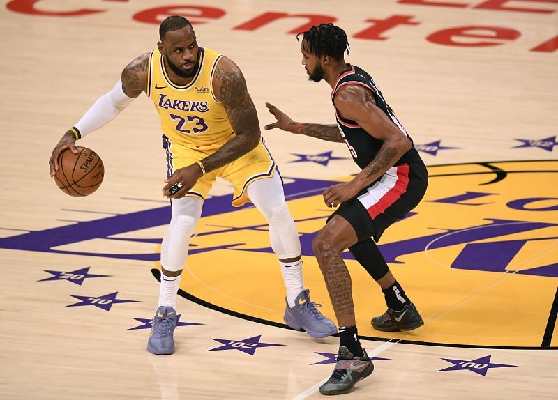 LeBron James guarded by Derrick Jones Jr.