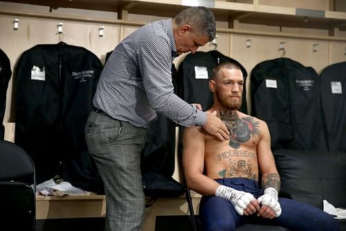 Conor McGregor warms up in his locker room