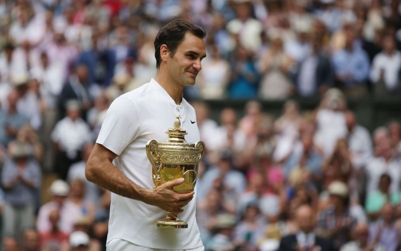 Roger Federer with the 2017 Wimbledon trophy