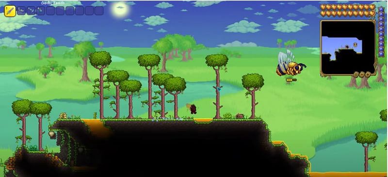 Most of the world found in this Terraria seed has been changed to being a jungle biome, with a plethora of hive and honey blocks available. (Image via Archane0/YouTube)