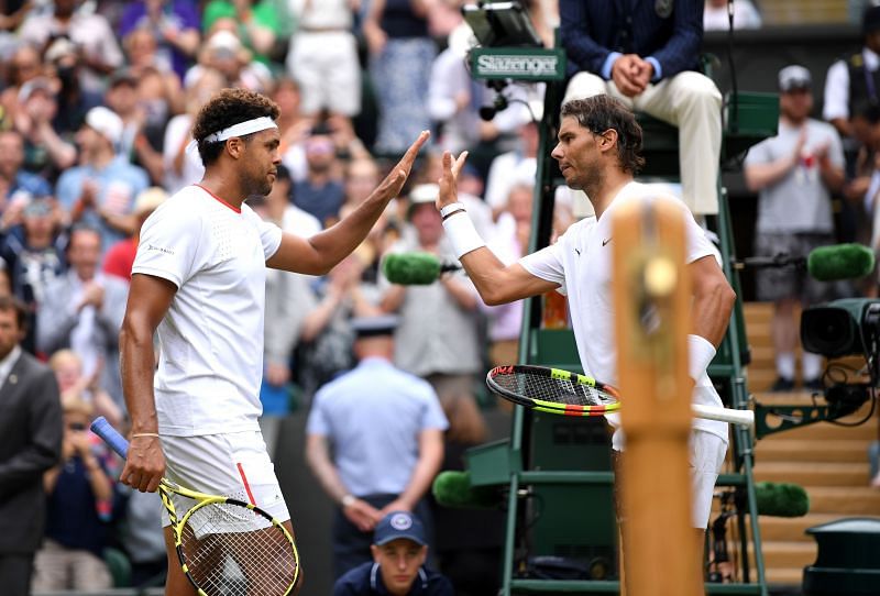 Jo-Wilfred Tsonga and Rafael Nadal at Wimbledon 2019