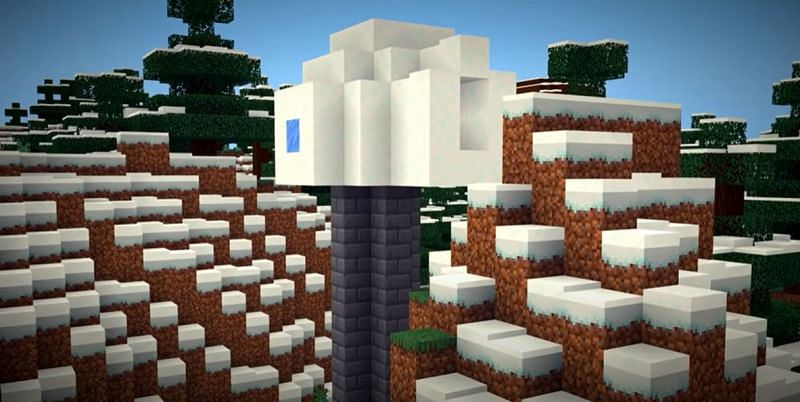 A tall Minecraft igloo with the route to it&#039;s basement fully exposed. (Image via Minecraft &amp; Chill/YouTube)