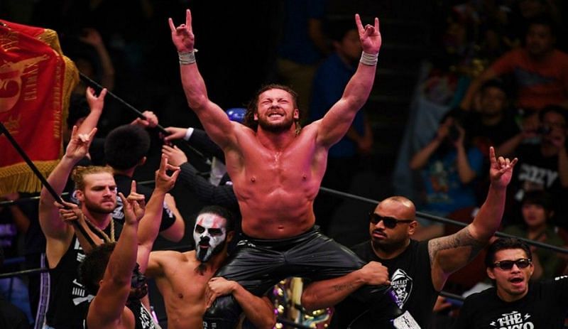 Kenny Omega with the rest of the Bullet Club.