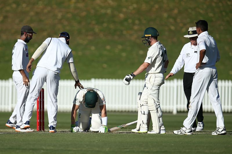 Indian cricketers checked on Will Pucovski after he was hit on the helmet