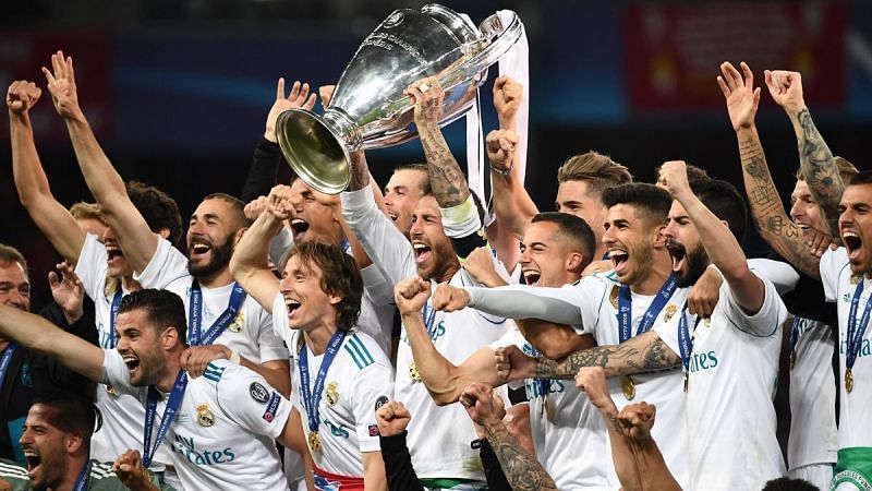 Real Madrid players celebrating their 2017/18 UCL win.