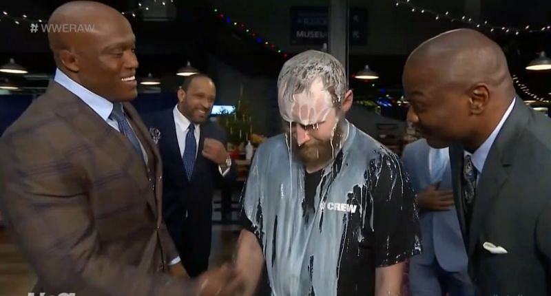 The Hurt Business poured milk on a member of the WWE crew backstage