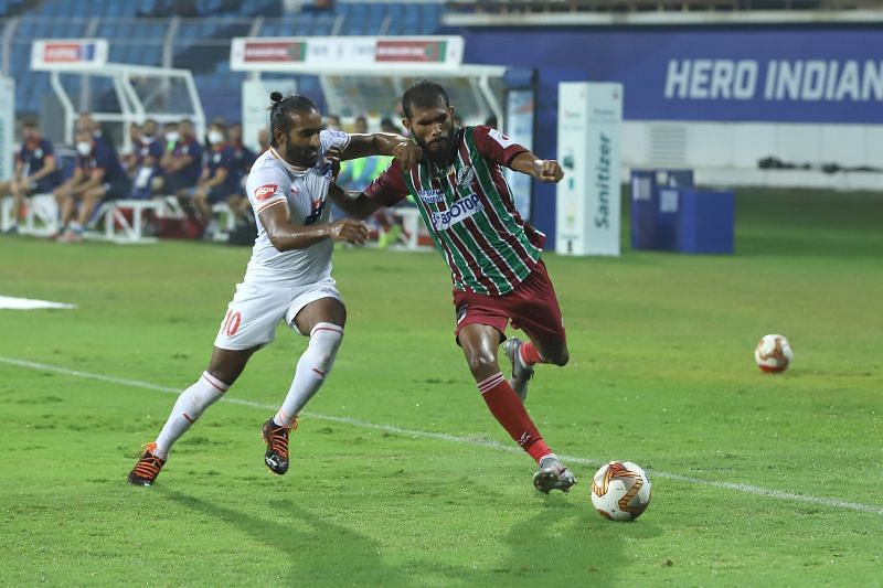 ATK Mohun Bagan&#039;s Subhasish Bose shields the ball against Bengaluru FC&#039;s Harmanjot Khabra (Image Courtesy: ISL Media)