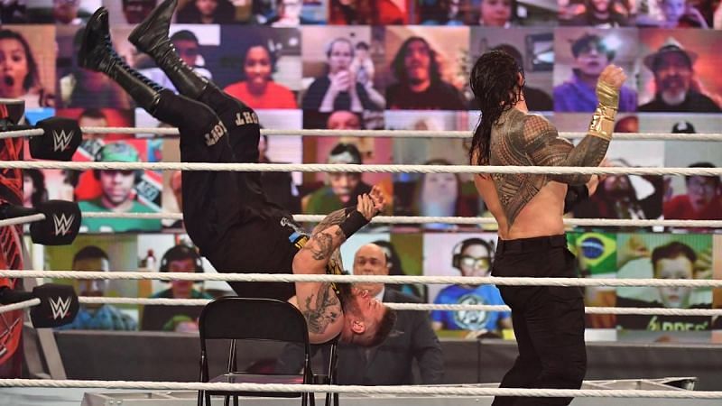 Roman Reigns and Kevin Owens brutalized each other during their match at TLC