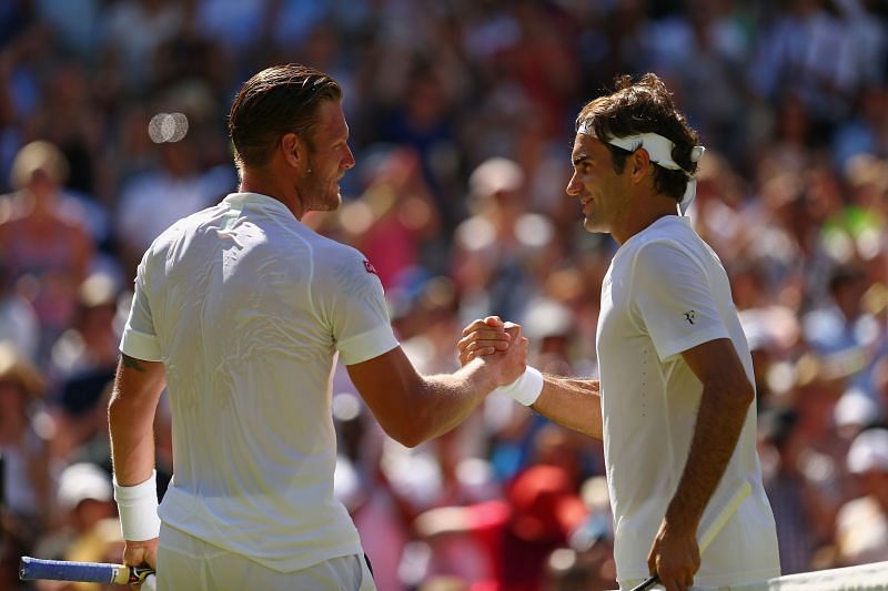 Sam Groth and Roger Federer at Wimbledon in 2015