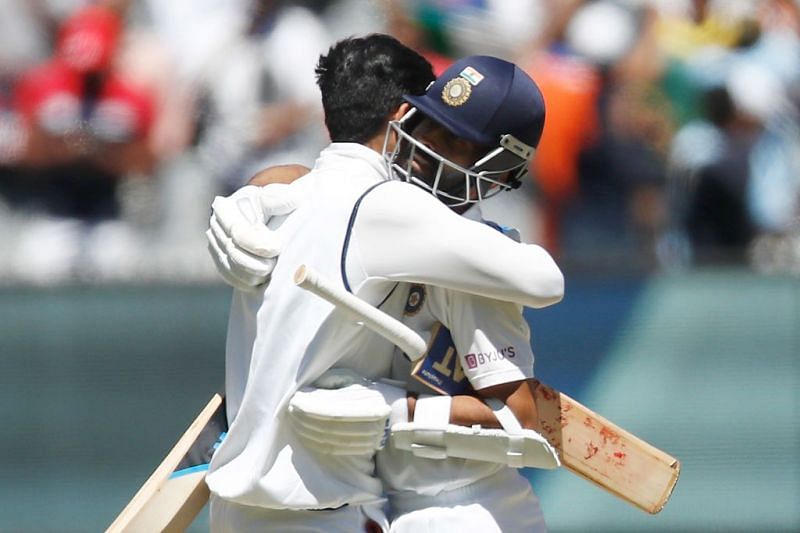 Captain Ajinkya Rahane (right) hit the winning runs for India in Melbourne.