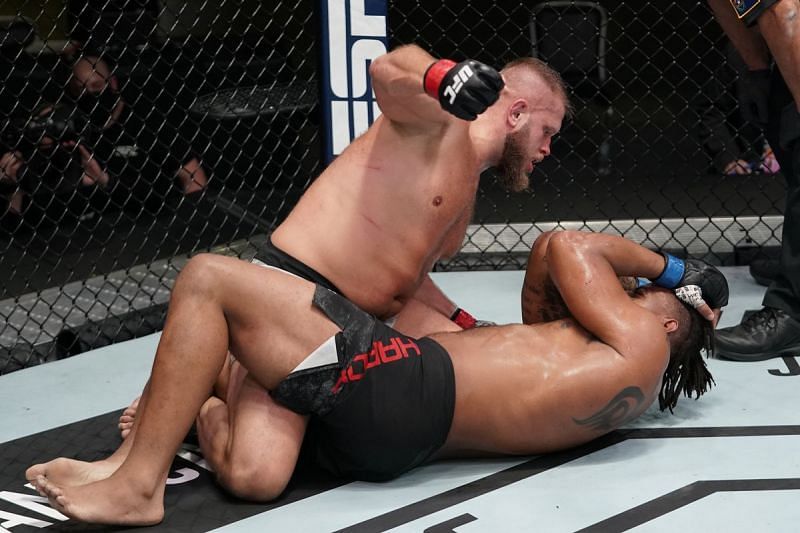 Former NFL star Greg Hardy was stopped by Marcin Tybura last night, suffering his first TKO loss in the UFC