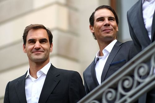 Roger Federer and Rafael Nadal (R)